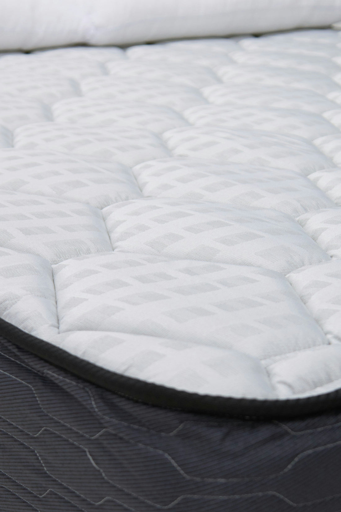 Premium hotel mattress with crisp white linen in a luxury Zanzibar hotel room — Atlas Hospitality Supply, Zanzibar's specialist hotel mattress supplier