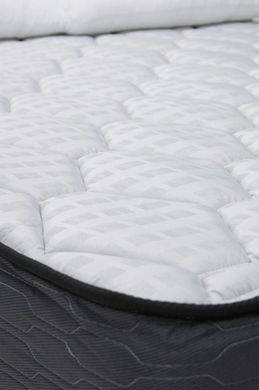 Premium hotel mattress with crisp white linen in a luxury Zanzibar hotel room — Atlas Hospitality Supply, Zanzibar's specialist hotel mattress supplier